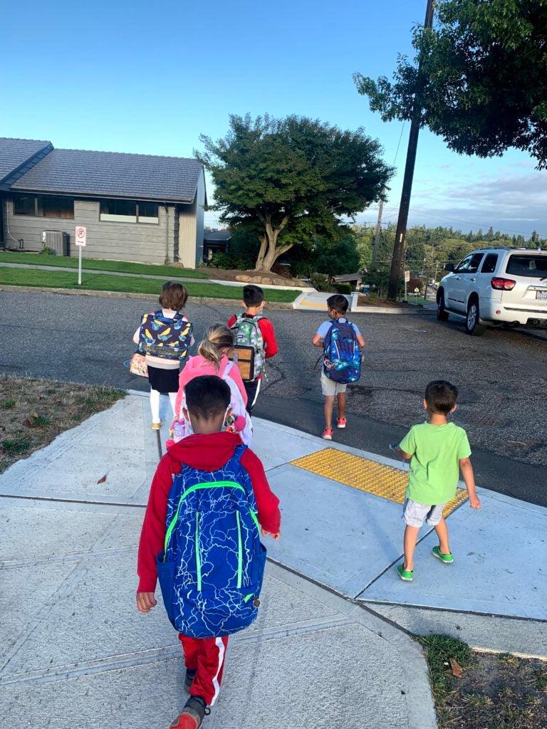Group of students walking to North Beach Elementary